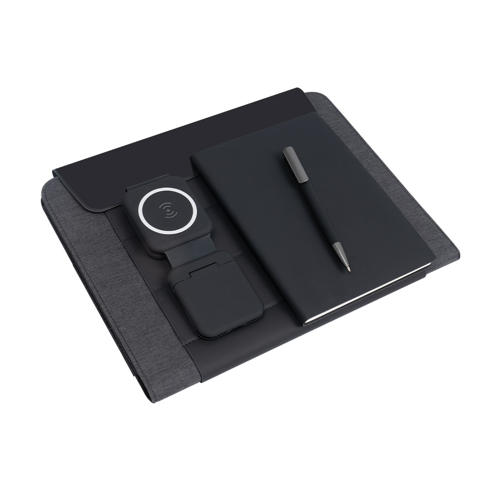 Corporate tech portfolio gift set with notebook, pen and 3-in-1 wireless charger inside a laptop case.